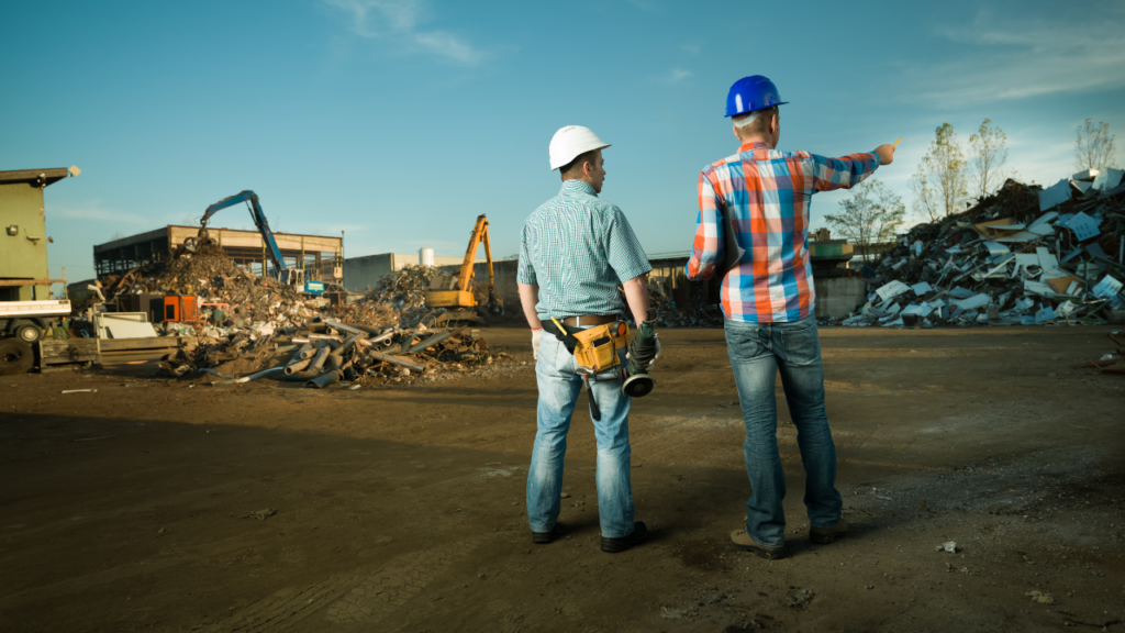 The scrap buyer and the scrap owner discussing after been connected by a connector.